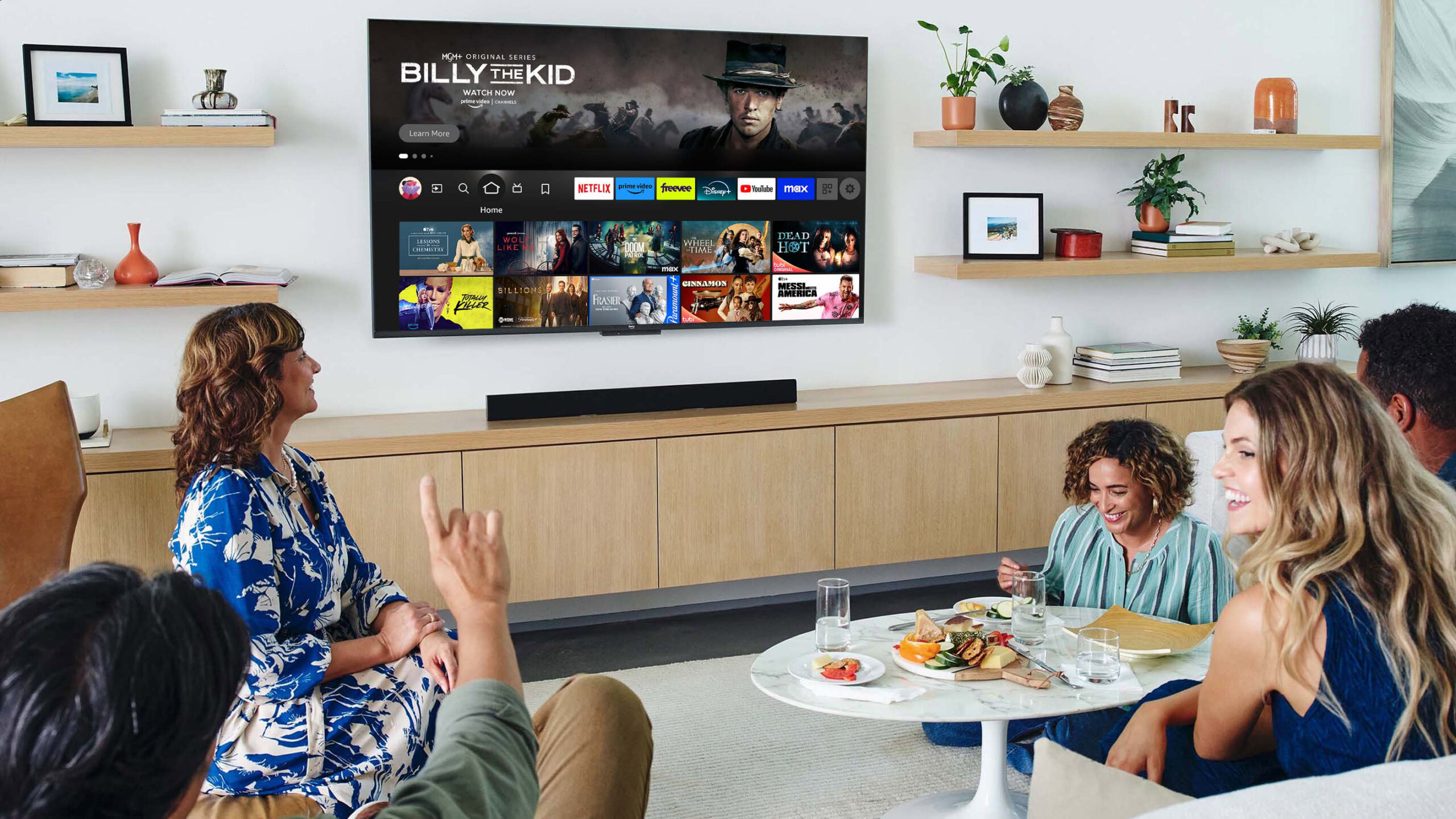 Amazon Fire TV Omni QLED Series 65 Inch 4K UHD smart TV in living room