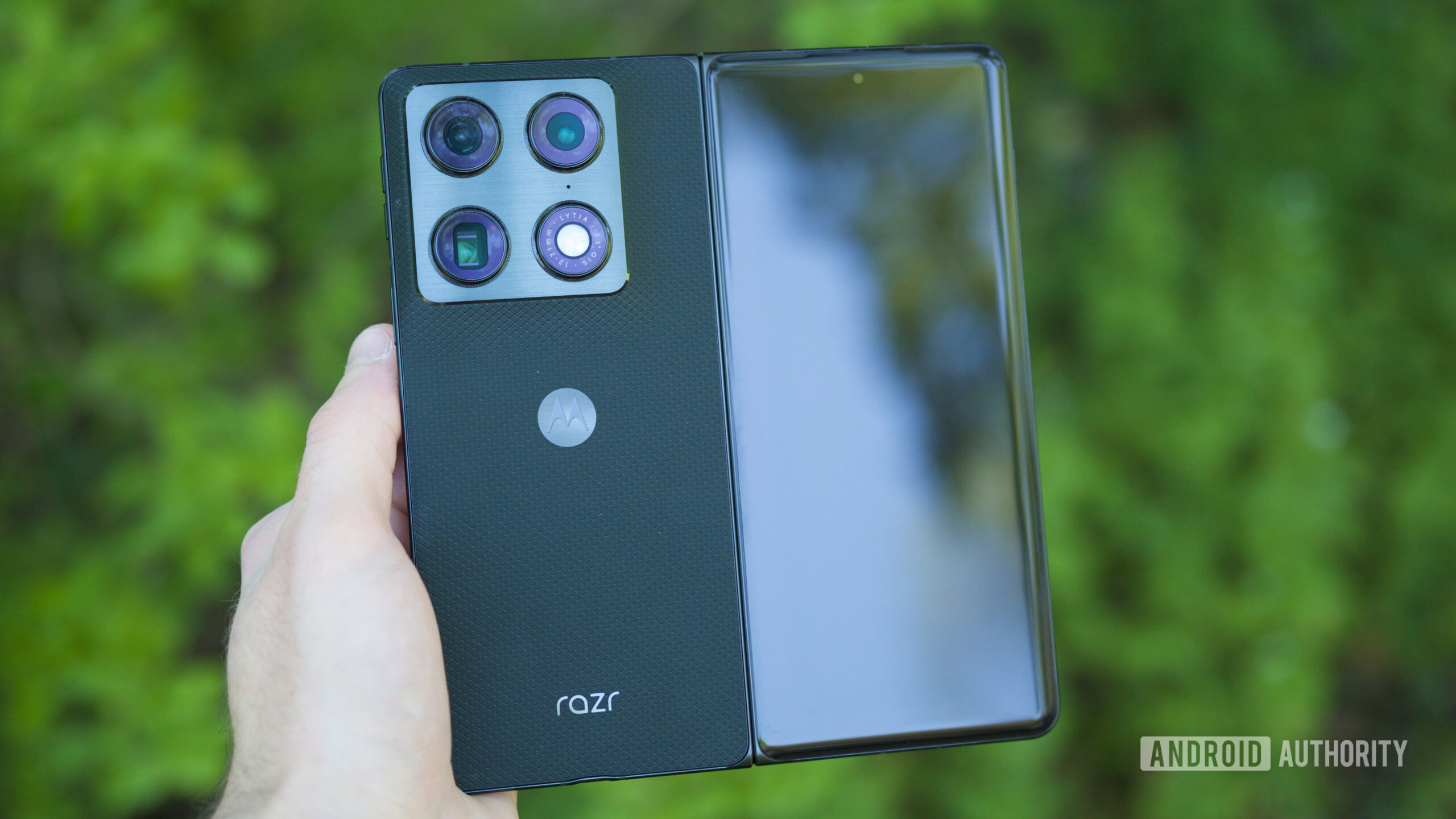 Someone holding the Motorola Razr Fold with the phone unfolded.