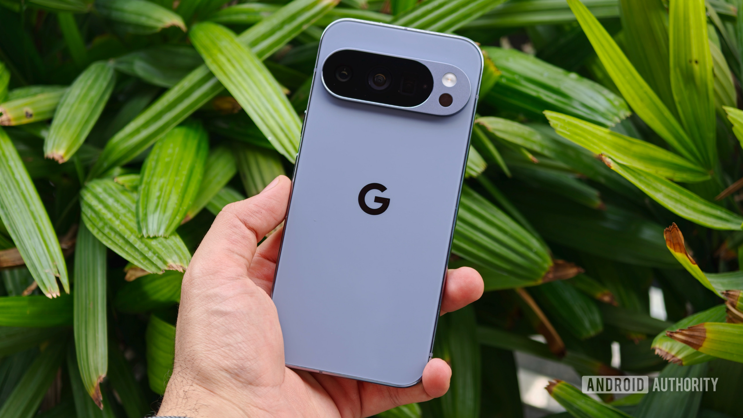 A hand holding the Google Pixel 10 Pro