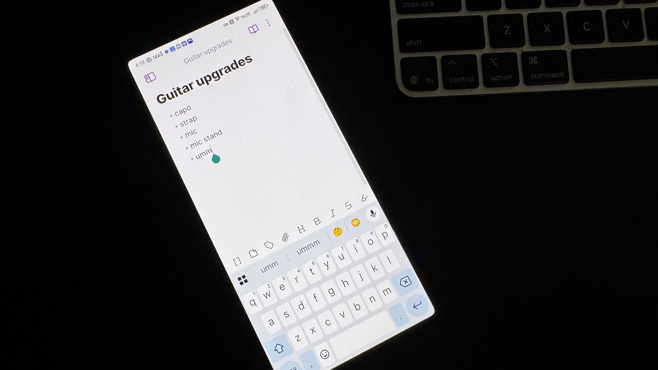 An Android phone on a black background with an Obsidian note open.