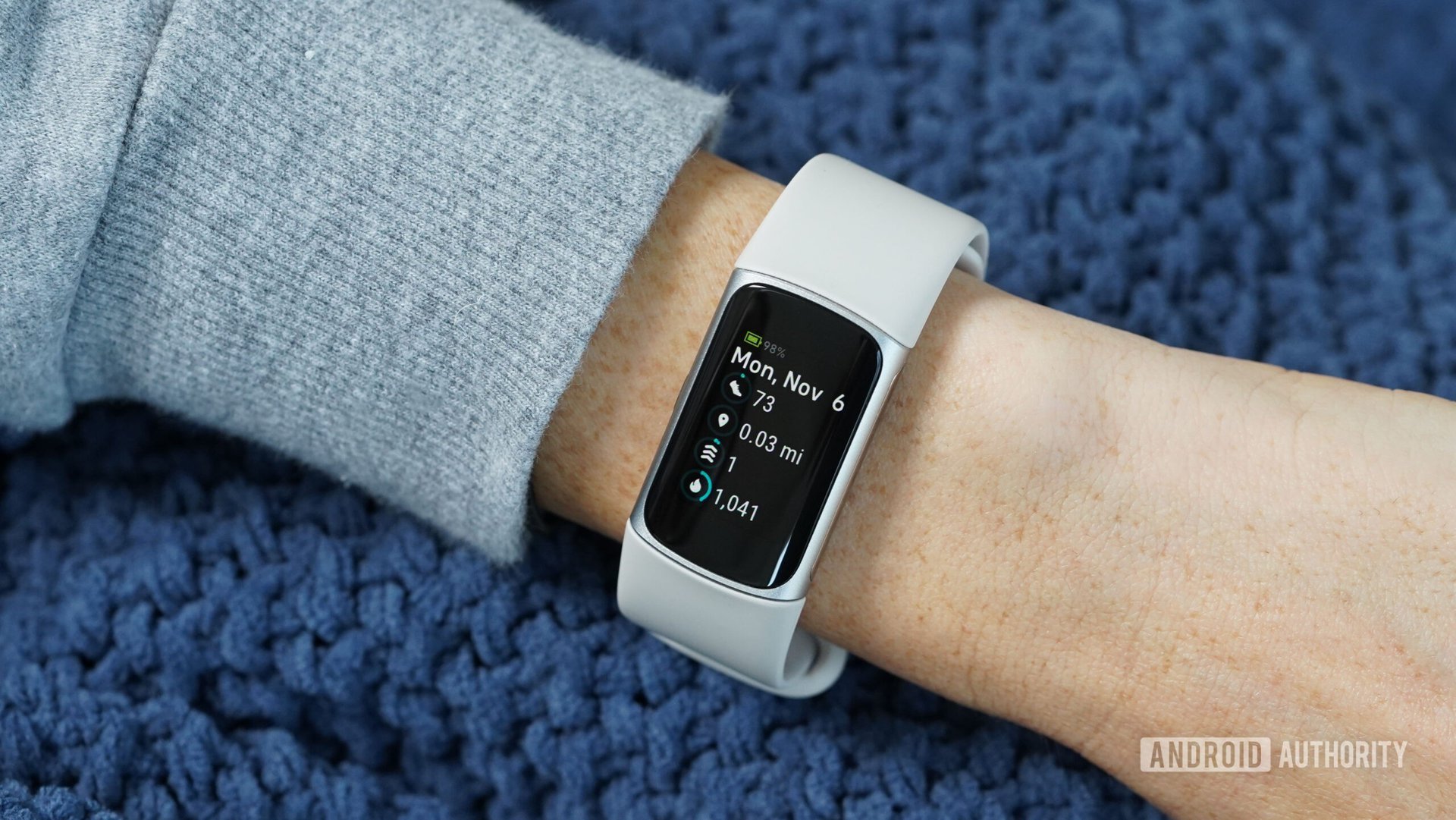 Fitbit Charge 6 displaying stats.