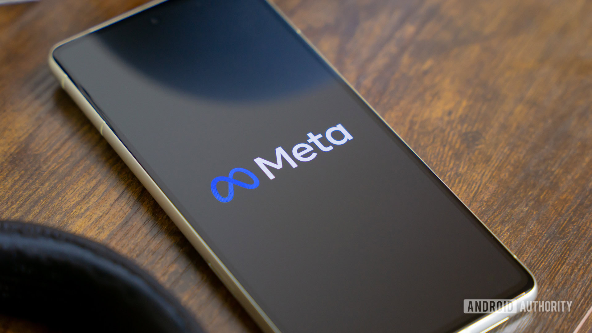 Meta logo on smartphone stock photo
